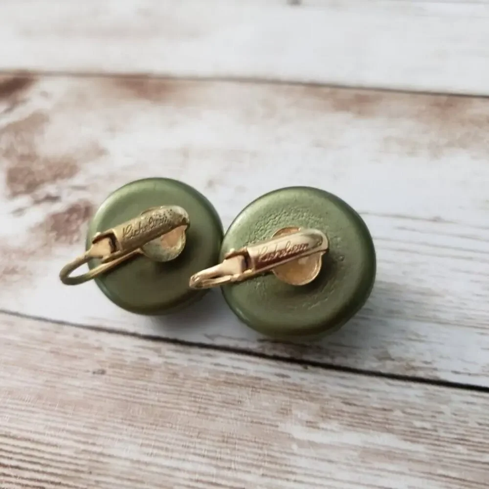 Vintage Richelieu Clip On Earrings - Uneven Domed Circle Metallic Green